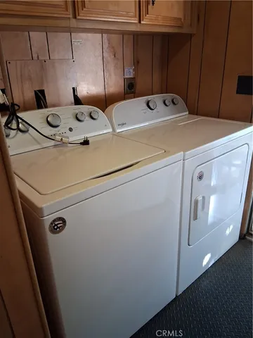 a room with water heater and racks