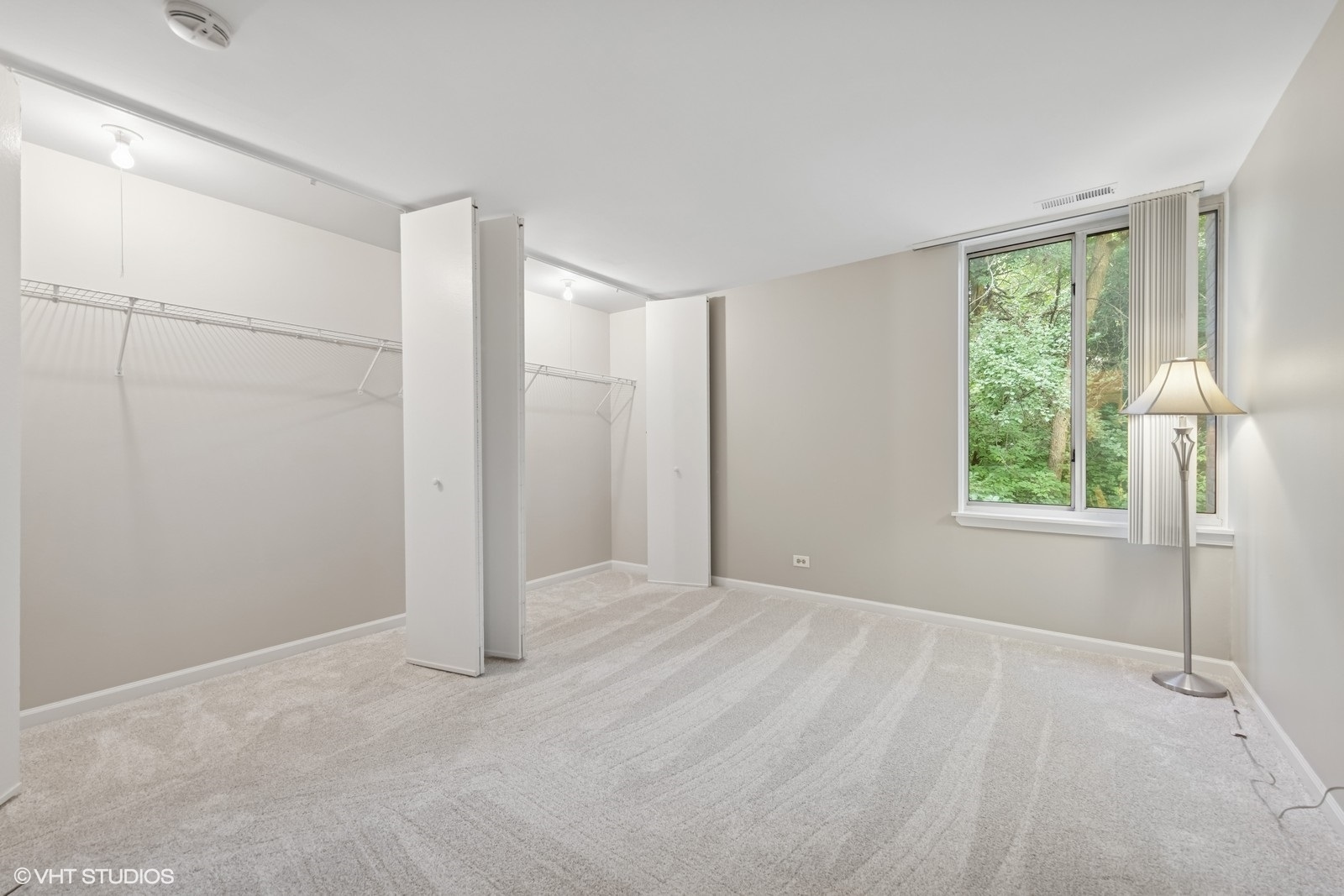 5900 Forest View Road, Unit 2A Lisle, IL 60532 - Photo 14 of 24 a view of an empty room with a window