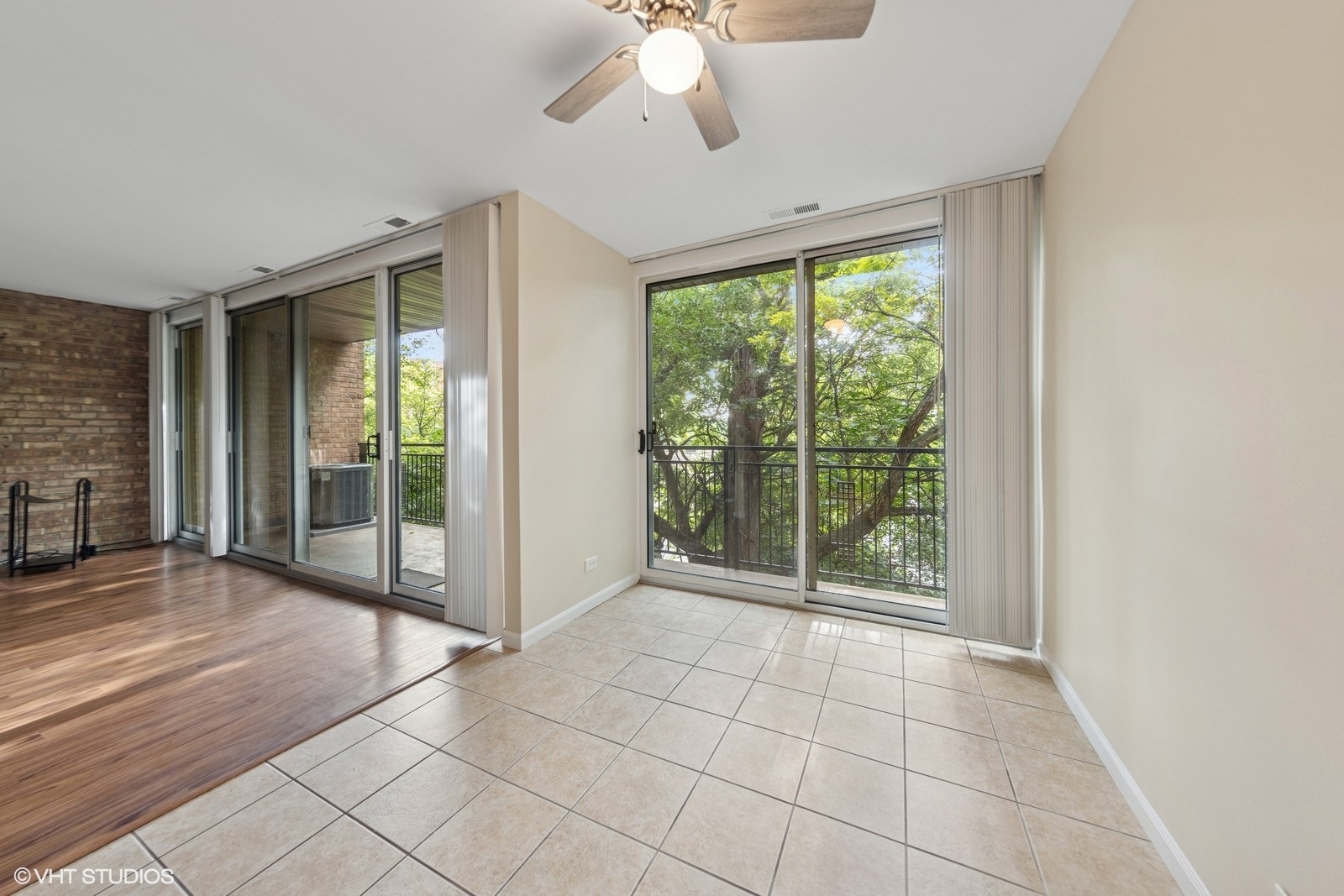 5900 Forest View Road, Unit 2A Lisle, IL 60532 - Photo 6 of 24 a view of an empty room with glass door