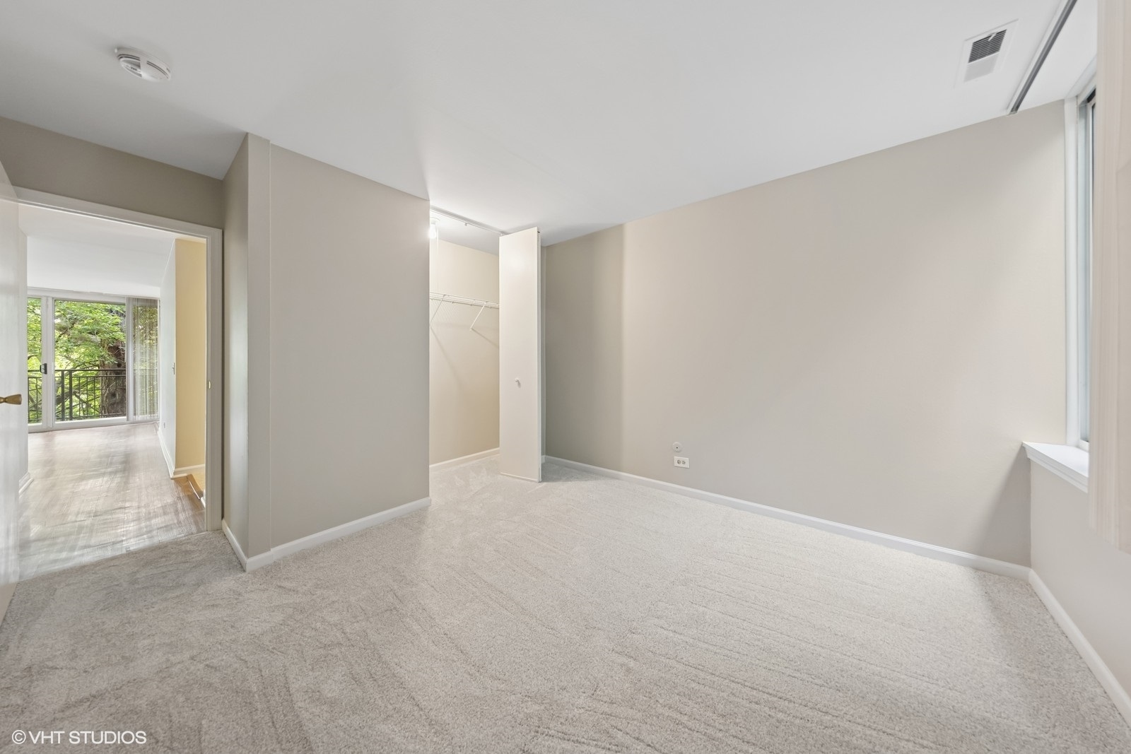 5900 Forest View Road, Unit 2A Lisle, IL 60532 - Photo 10 of 24 a view of an empty room and a window