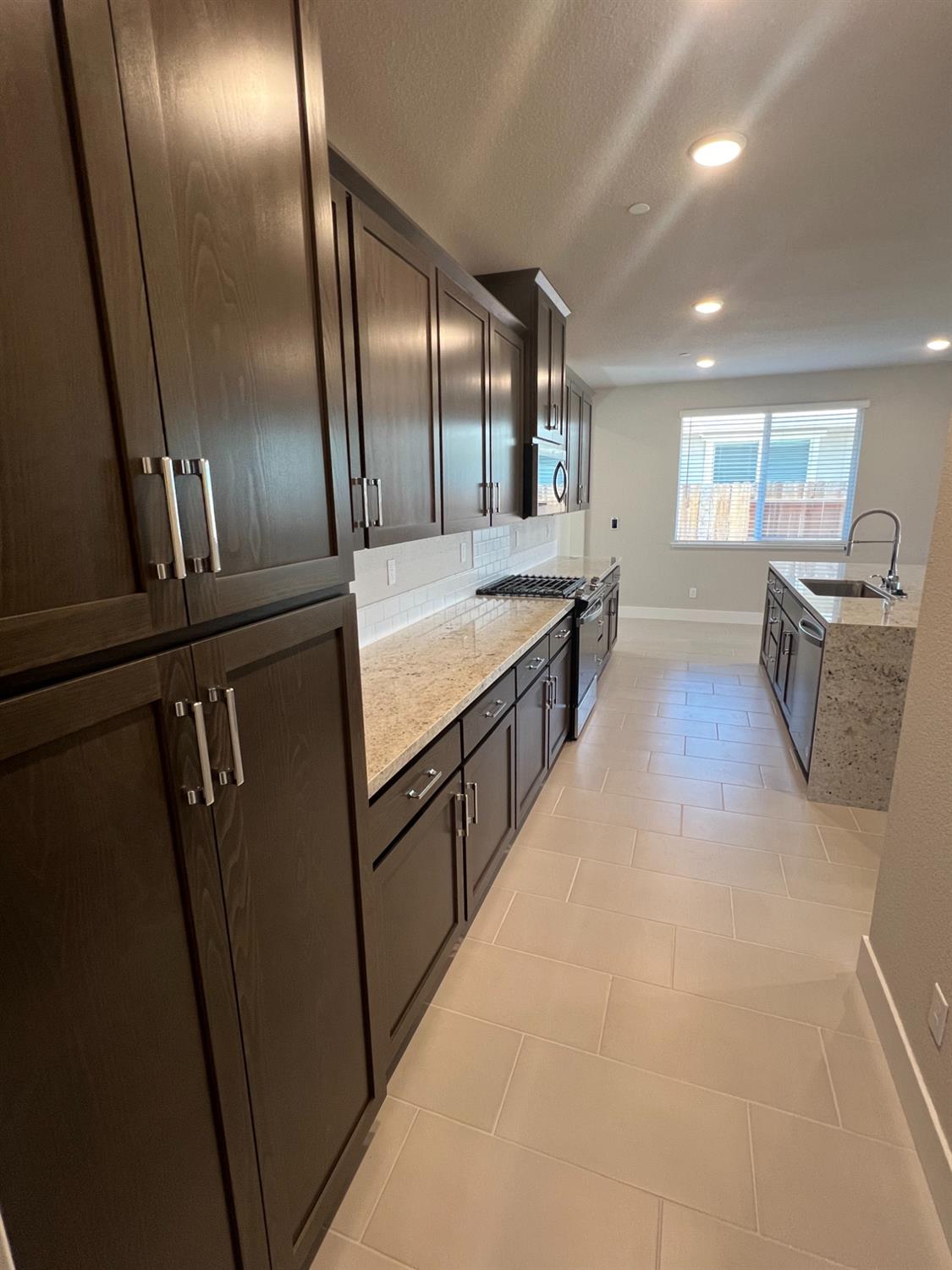 3063 Banano Way Rancho Cordova, CA 95742 - Photo 5 of 20 an empty room with wooden floor