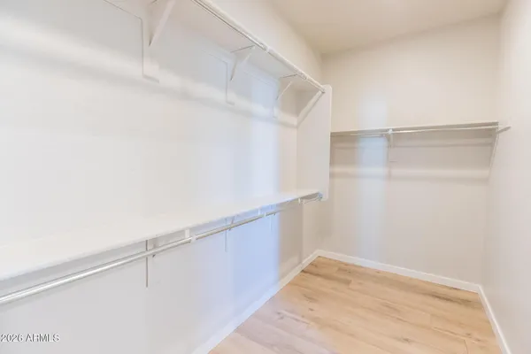 a view of an empty walk in closet