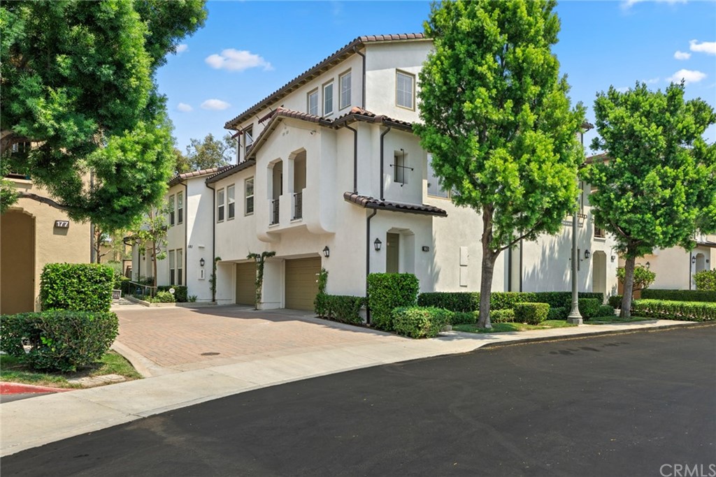 183 Lockford Irvine, CA 92602 - Photo 1 of 1 a view of a white house with a street