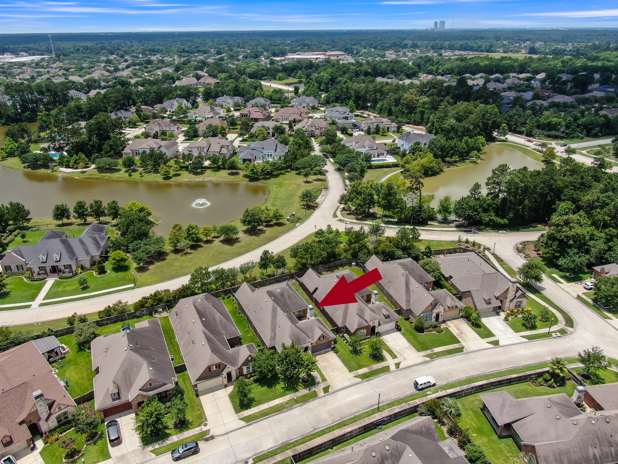 31714 Pierwood Court Spring, TX 77386 - Photo 44 of 49 an aerial view of lake and residential houses with outdoor space