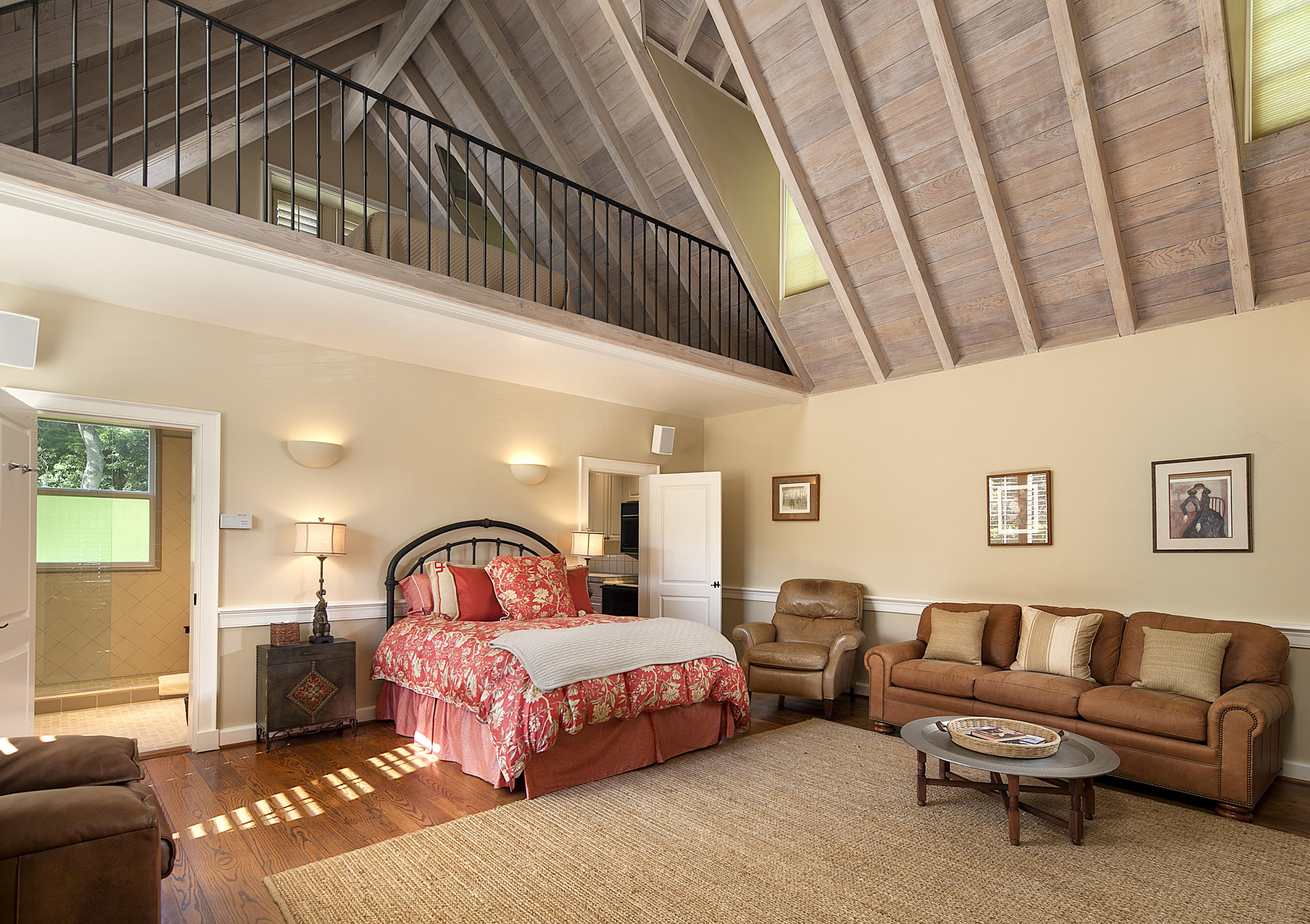 1966 East Valley Road Santa Barbara, CA 93108 - Photo 11 of 16 a spacious bedroom with a bed a couch and dresser