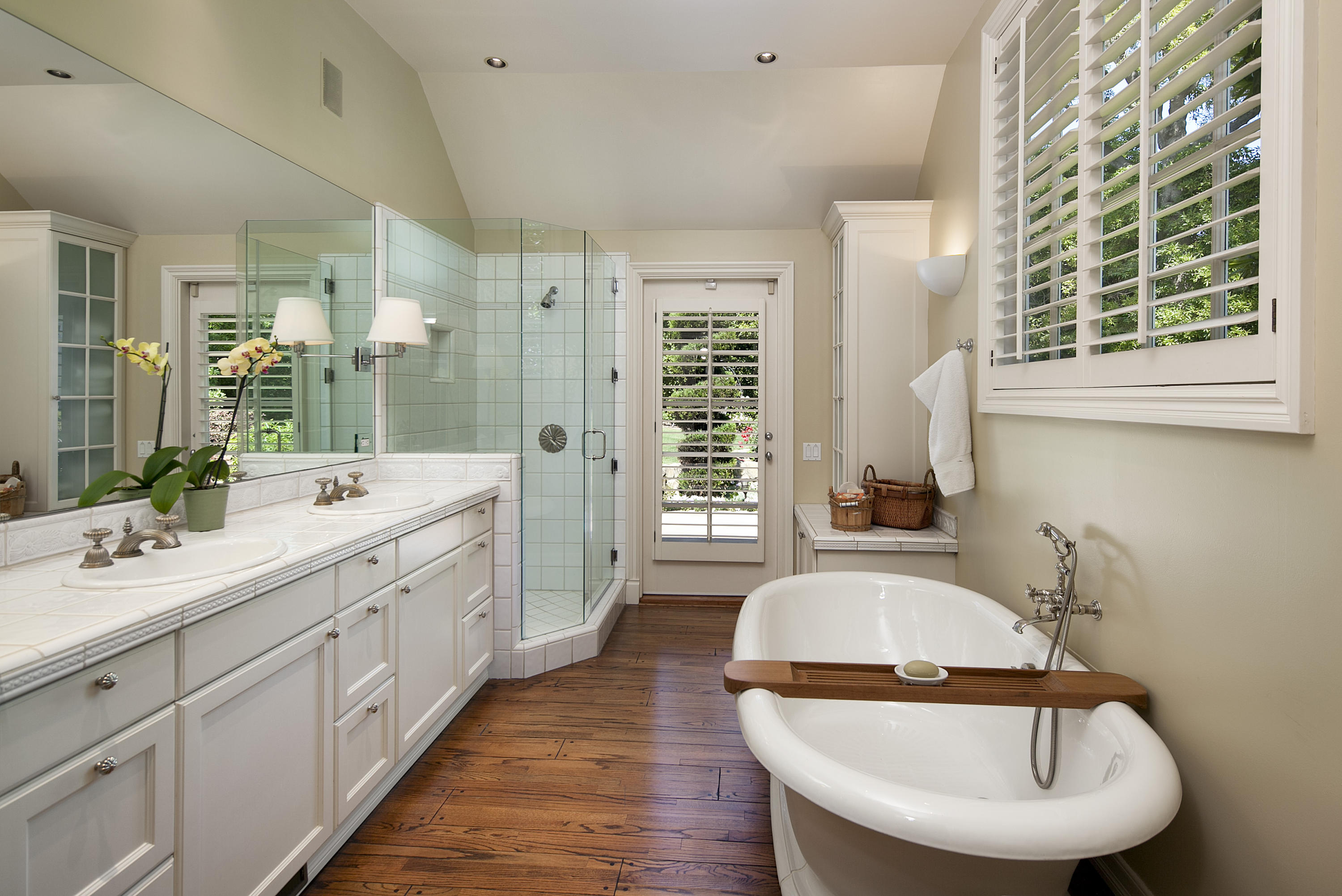 1966 East Valley Road Santa Barbara, CA 93108 - Photo 7 of 16 a bathroom with a tub sink and mirror