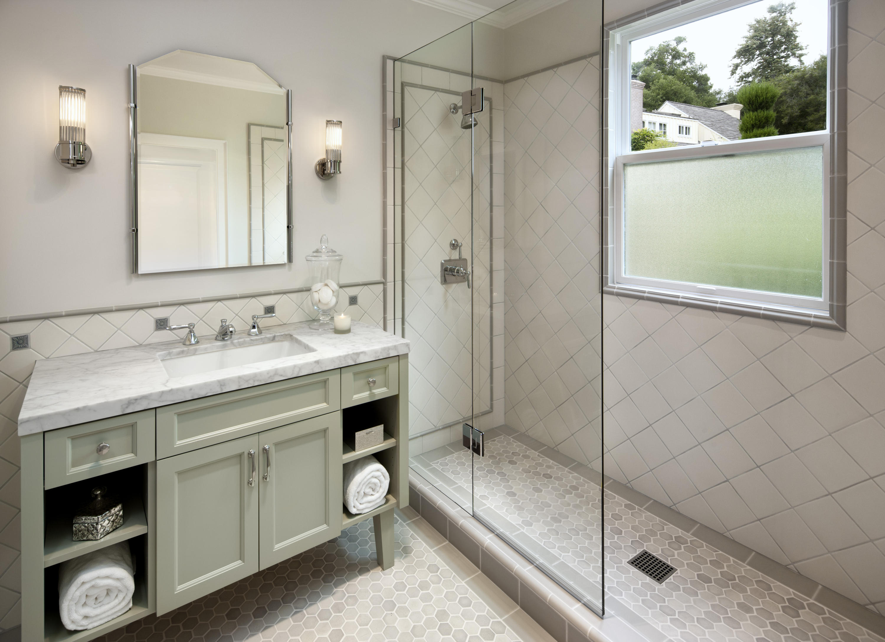 1966 East Valley Road Santa Barbara, CA 93108 - Photo 9 of 16 a spacious bathroom with a double vanity sink a mirror and a bathtub