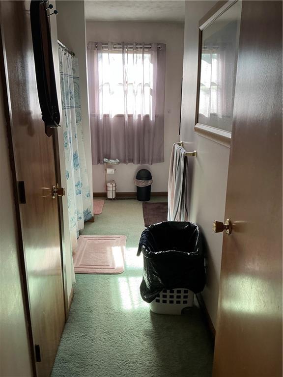 1652 Frew Mill Road New Castle, PA 16101 - Photo 15 of 25 a view of a livingroom with furniture and a large window