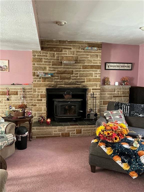 1652 Frew Mill Road New Castle, PA 16101 - Photo 2 of 25 a room with toys and a fireplace