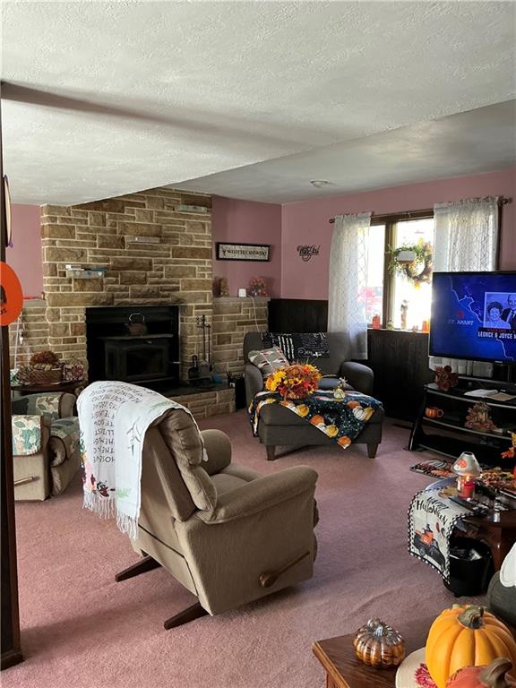1652 Frew Mill Road New Castle, PA 16101 - Photo 5 of 25 a living room with furniture and a fireplace