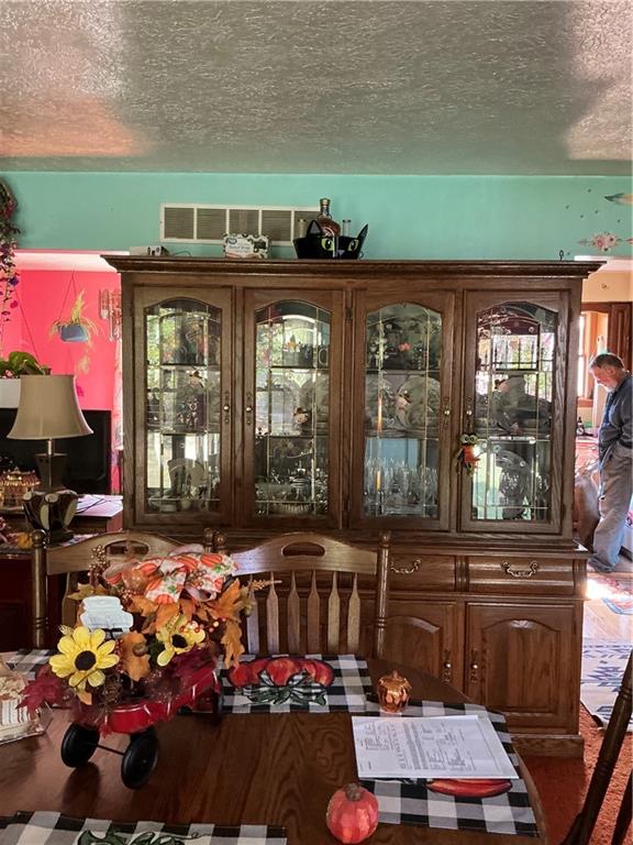 1652 Frew Mill Road New Castle, PA 16101 - Photo 7 of 25 a front view of a house with lots of green space and glass windows