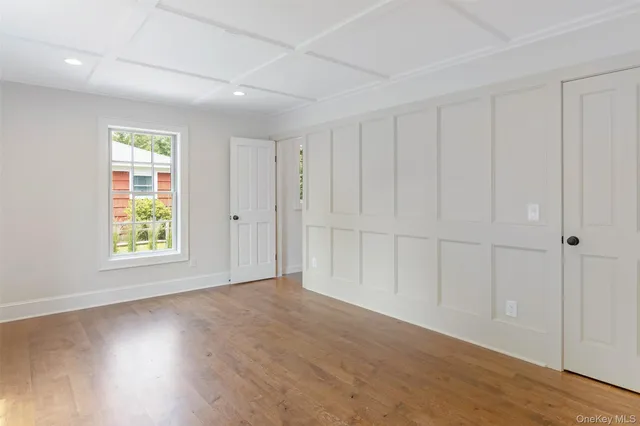 a view of a hallway with white walls