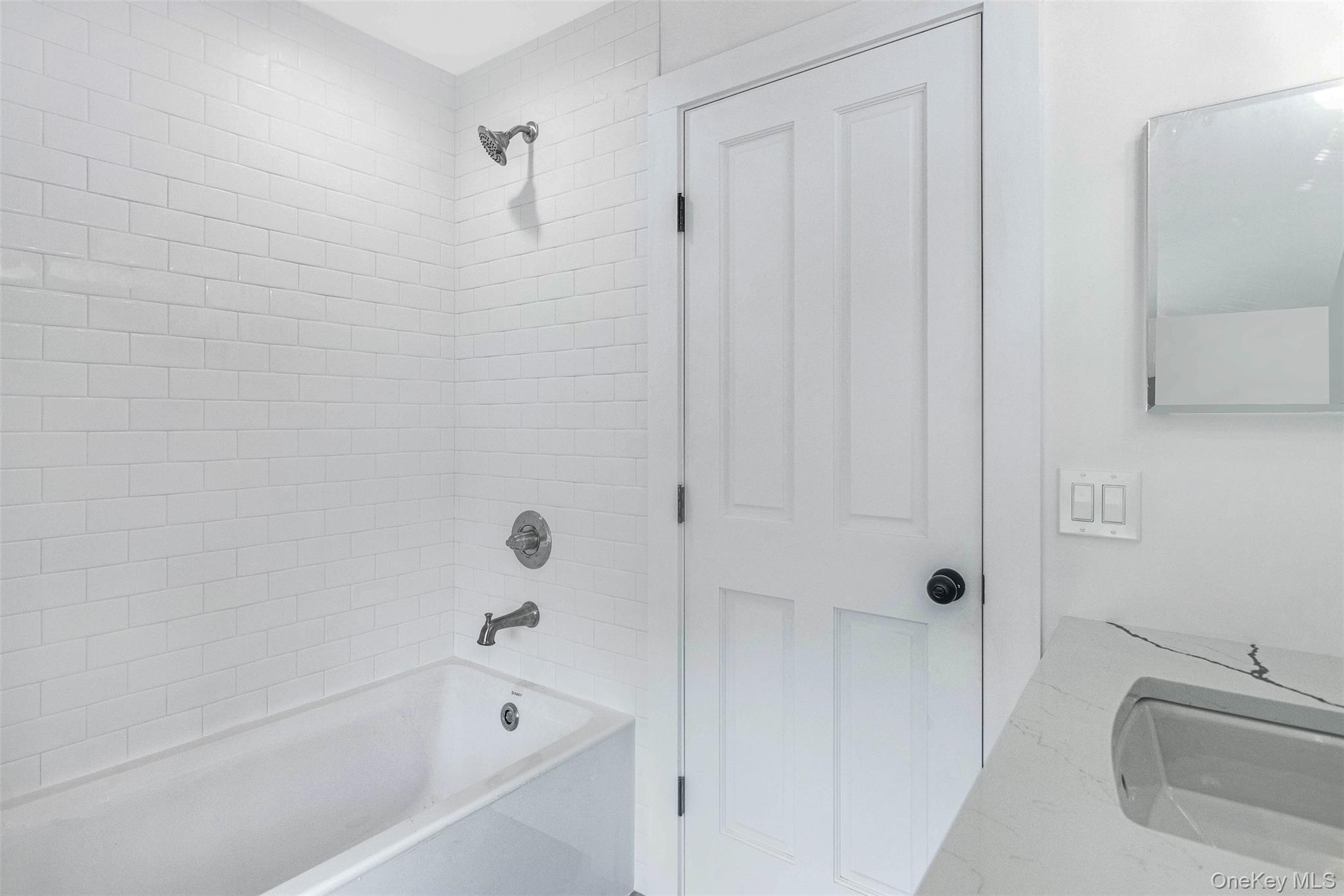 130 Sunset Lane Greenport, NY 11944 - Photo 18 of 34 Bathroom with shower / bathtub combination and vanity