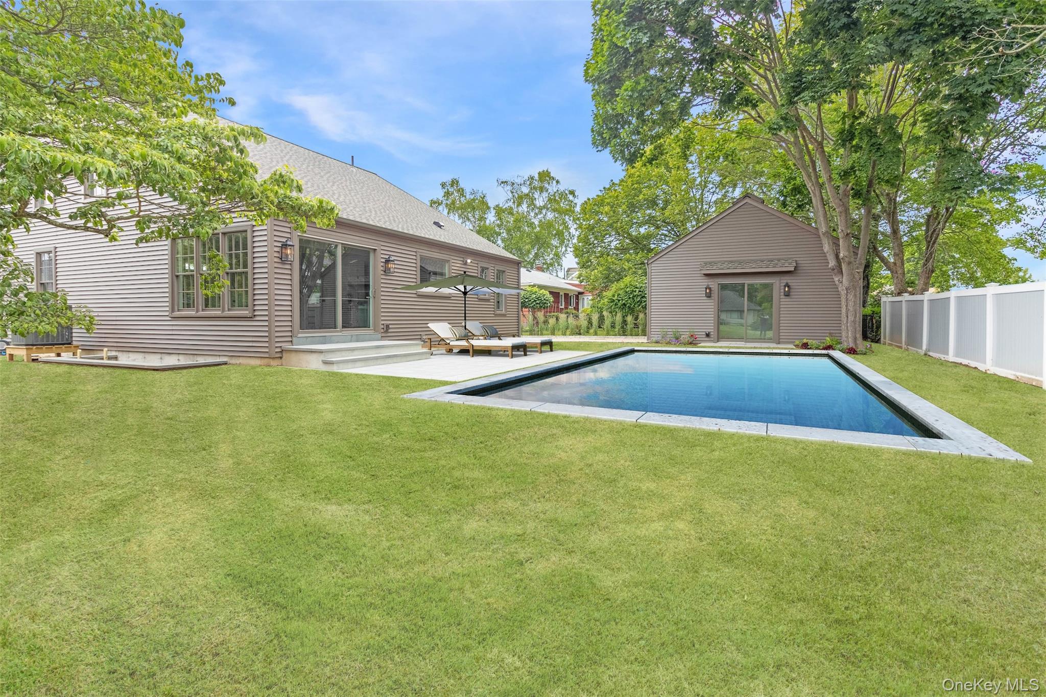 130 Sunset Lane Greenport, NY 11944 - Photo 27 of 34 View of pool featuring a patio