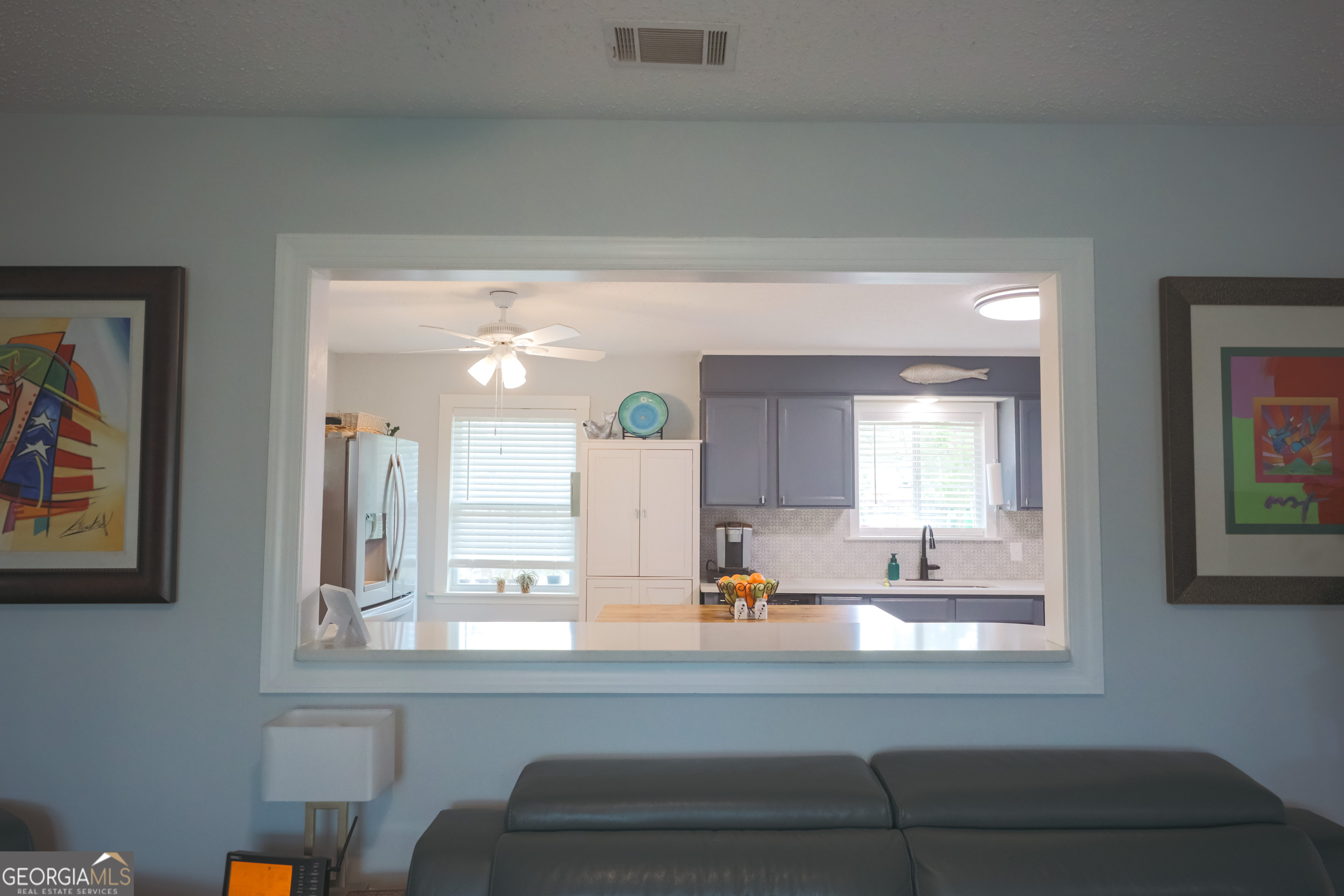 106 Beaver Drive Blackshear, GA 31516 - Photo 15 of 20 a bathroom with a sink and a large mirror