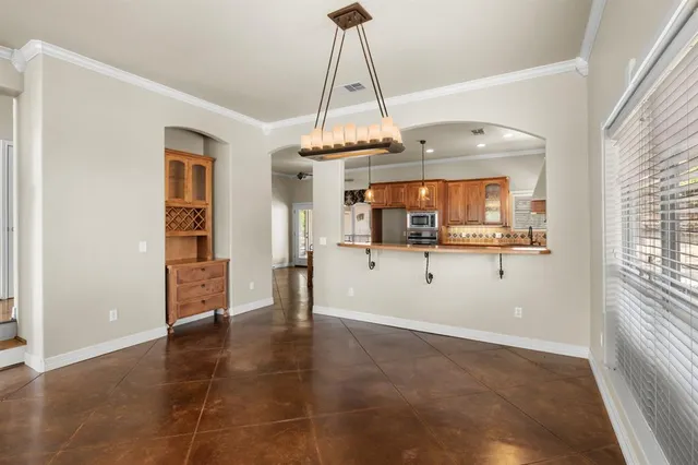 a view of a room with cabinet and window