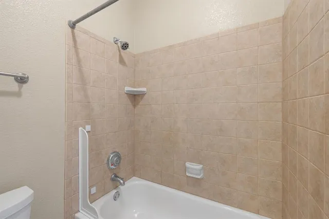 a bathroom with a sink and toilet