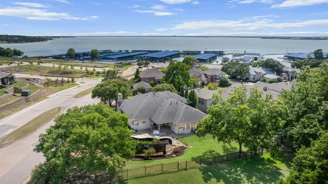an aerial view of a house with outdoor space
