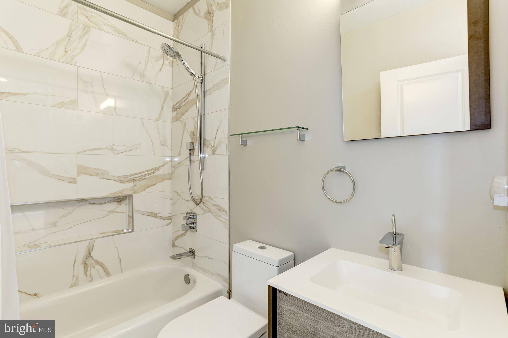 1210 Independence Avenue Southeast Washington, DC 20003 - Photo 20 of 29 Hall bath with classic finishes