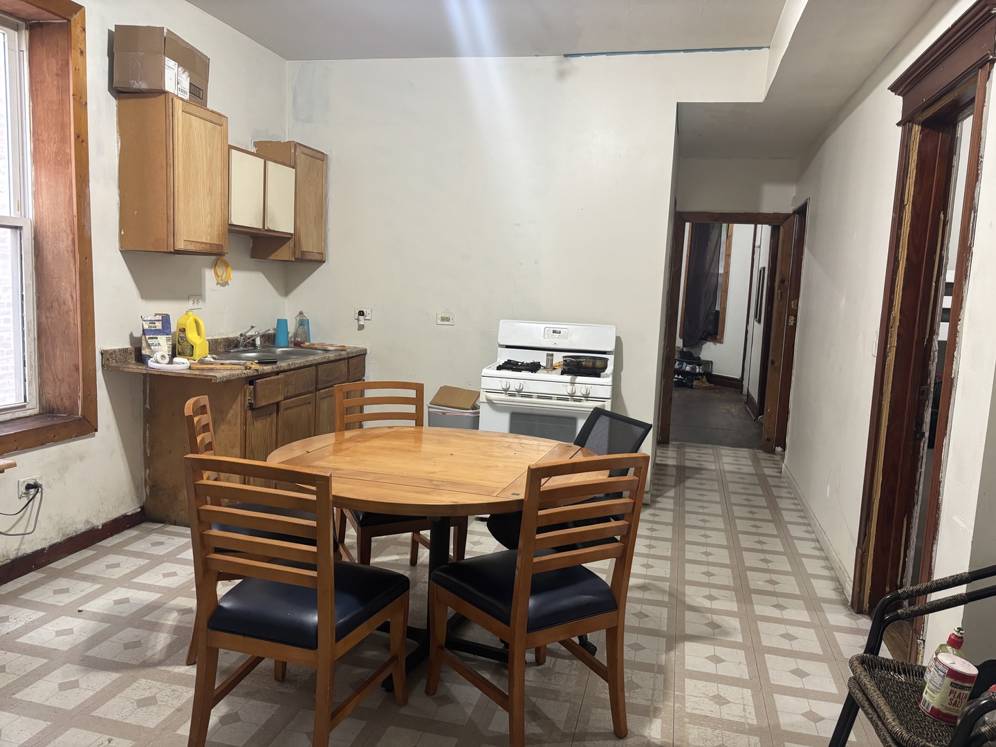 2541 South Springfield Avenue Chicago, IL 60623 - Photo 2 of 8 a dining room with furniture and window