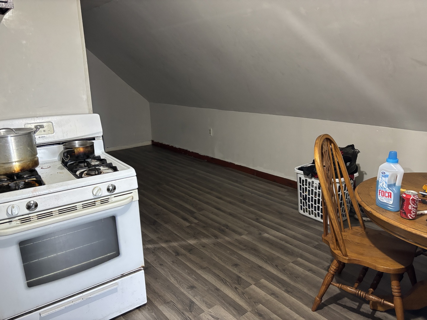 2541 South Springfield Avenue Chicago, IL 60623 - Photo 4 of 8 a stove top oven sitting inside of a kitchen