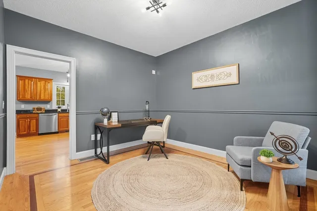 a workspace with furniture and window