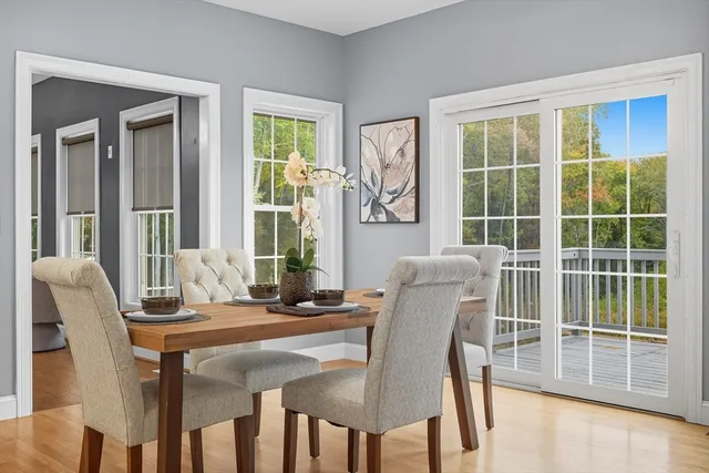 a dining room with furniture and windows