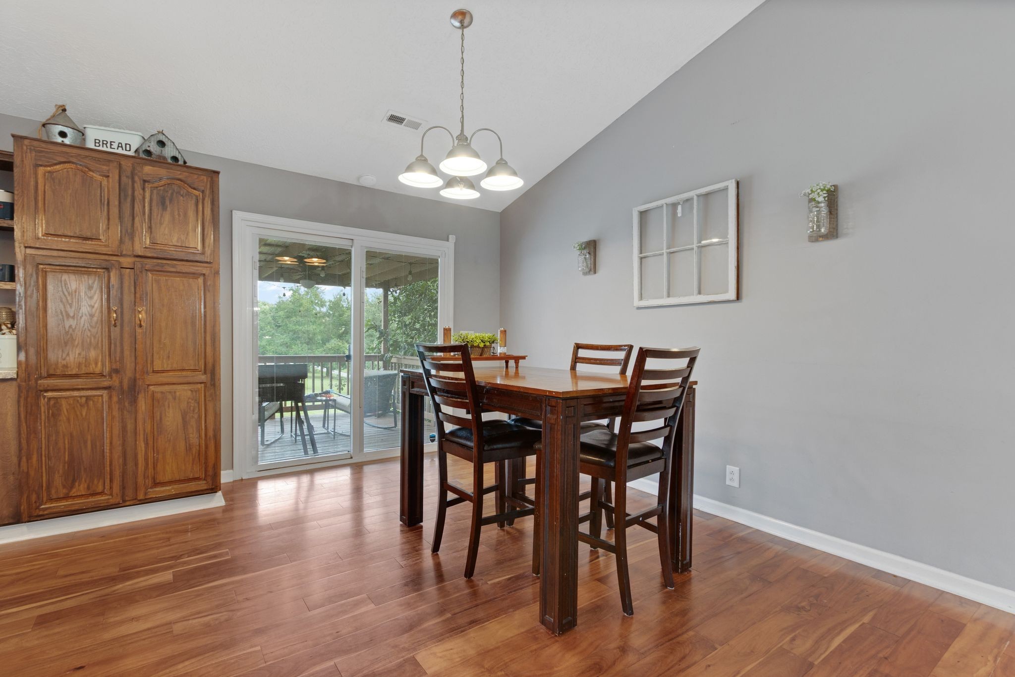 2137 Lee Road Spring Hill, TN 37174 - Photo 13 of 49 a view of a dining room with furniture window and wooden floor