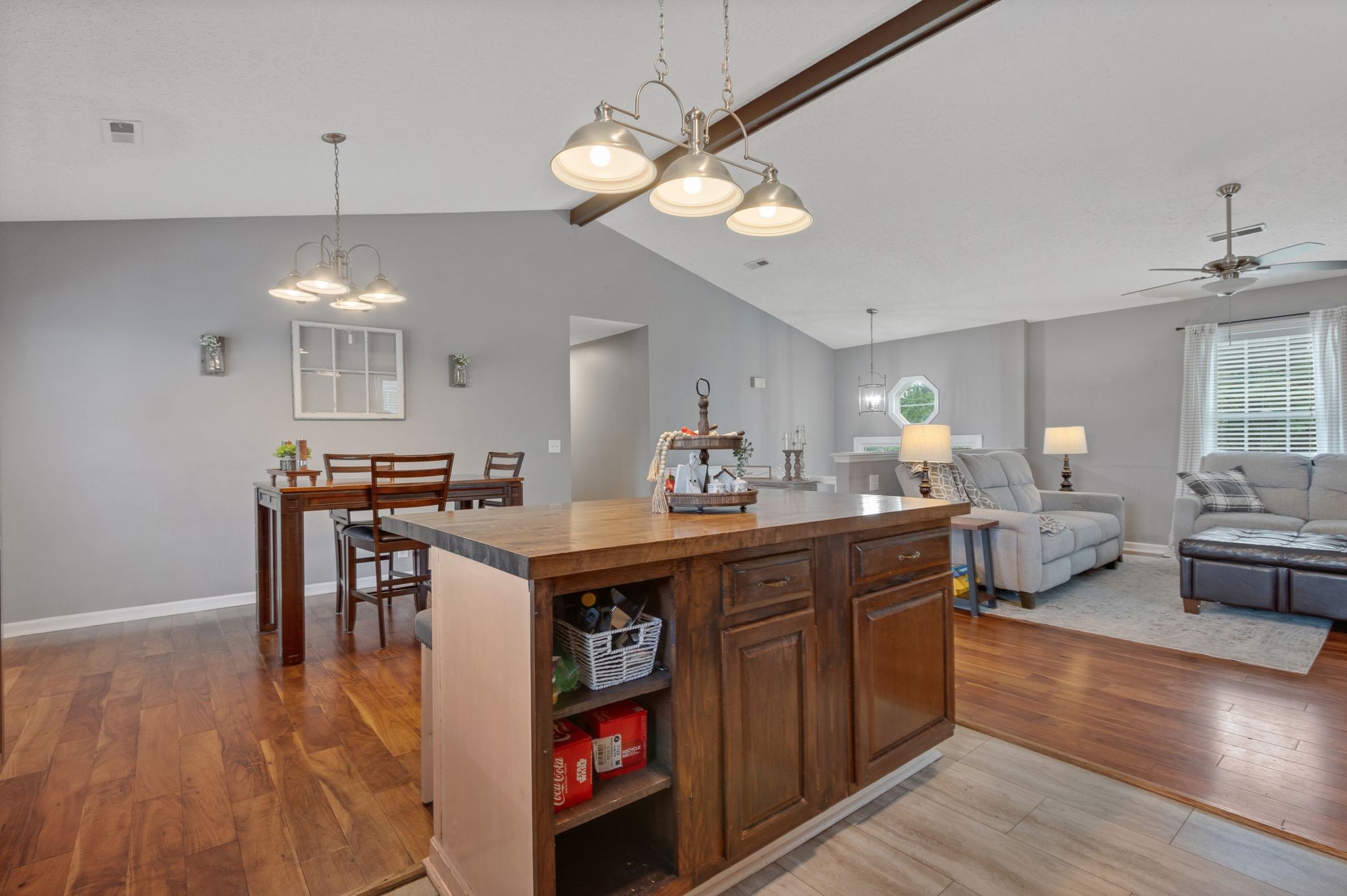 2137 Lee Road Spring Hill, TN 37174 - Photo 18 of 49 a kitchen island with cabinets and wooden floor