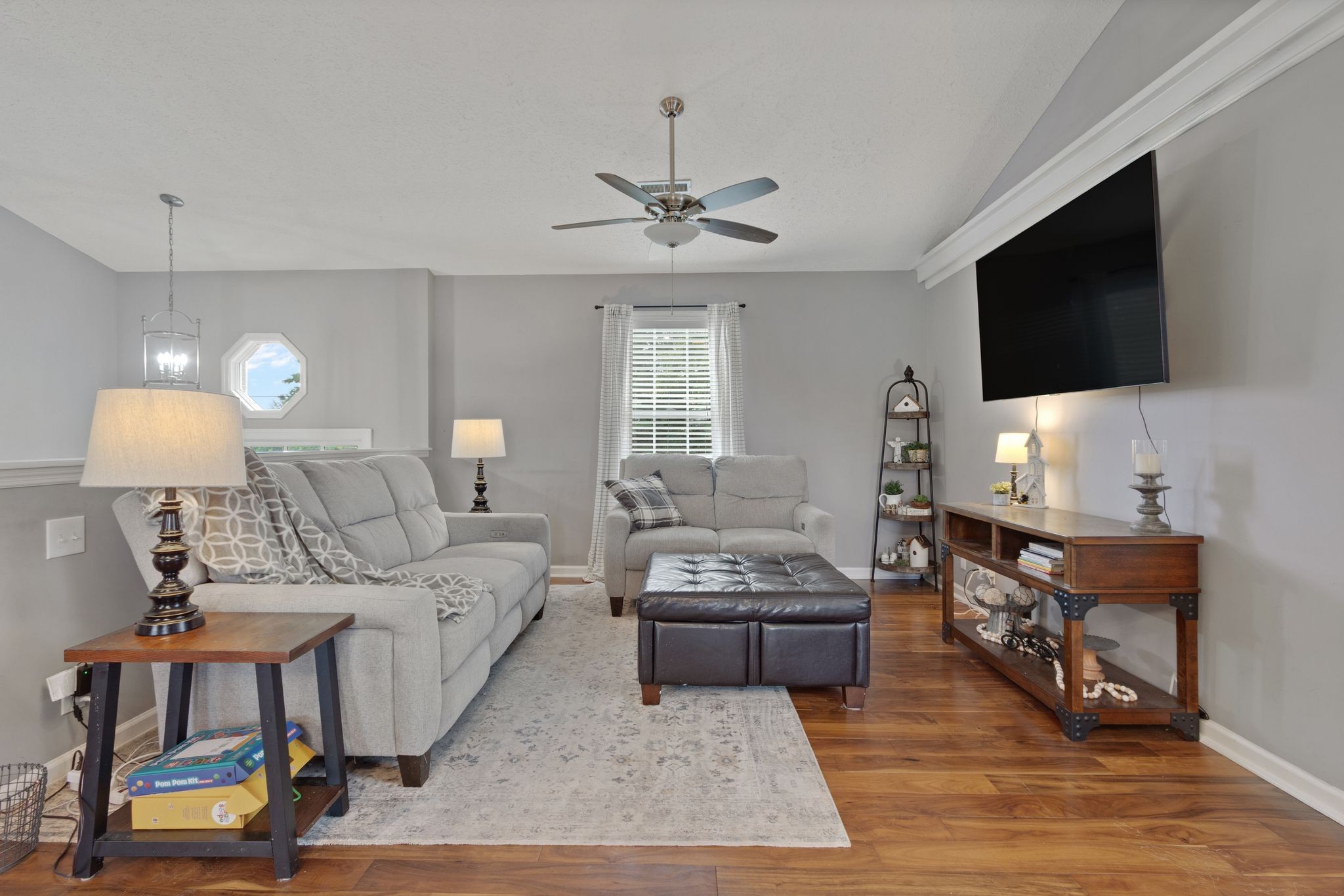 2137 Lee Road Spring Hill, TN 37174 - Photo 19 of 49 a living room with furniture and a flat screen tv