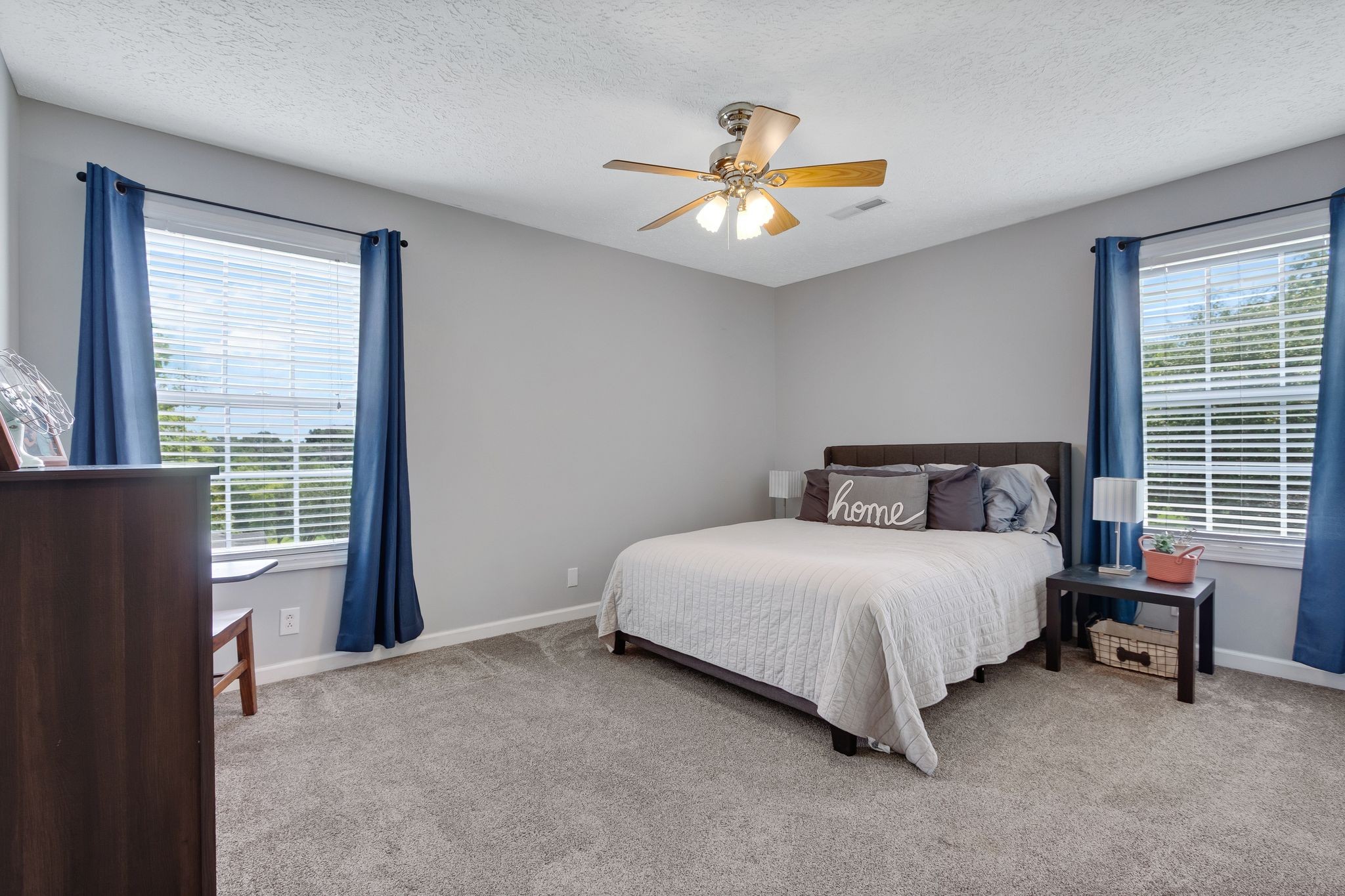 2137 Lee Road Spring Hill, TN 37174 - Photo 27 of 49 a bedroom with a bed and a chandelier