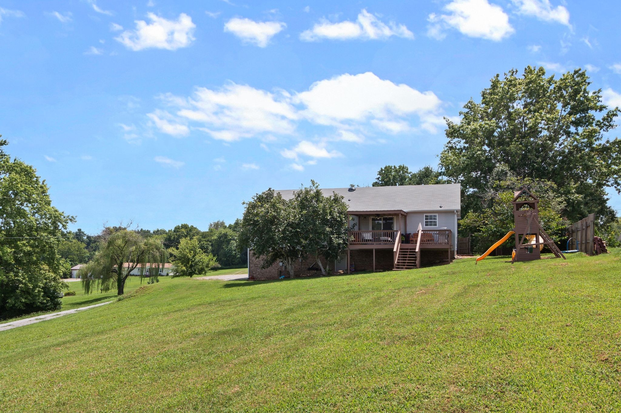 2137 Lee Road Spring Hill, TN 37174 - Photo 39 of 49 a view of a house with a big yard