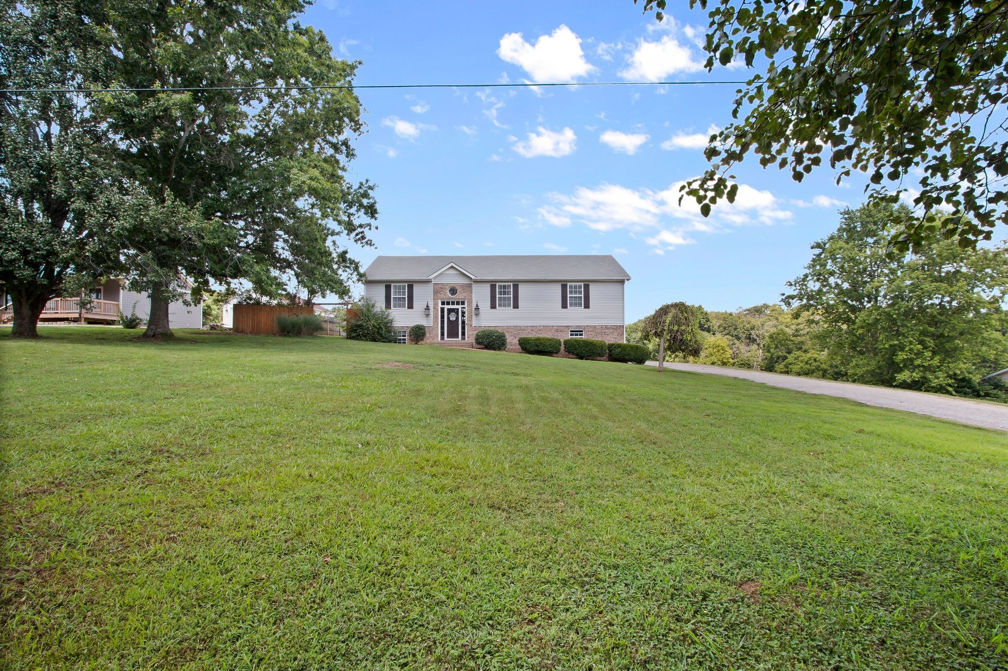 2137 Lee Road Spring Hill, TN 37174 - Photo 7 of 49 a view of a house with a big yard