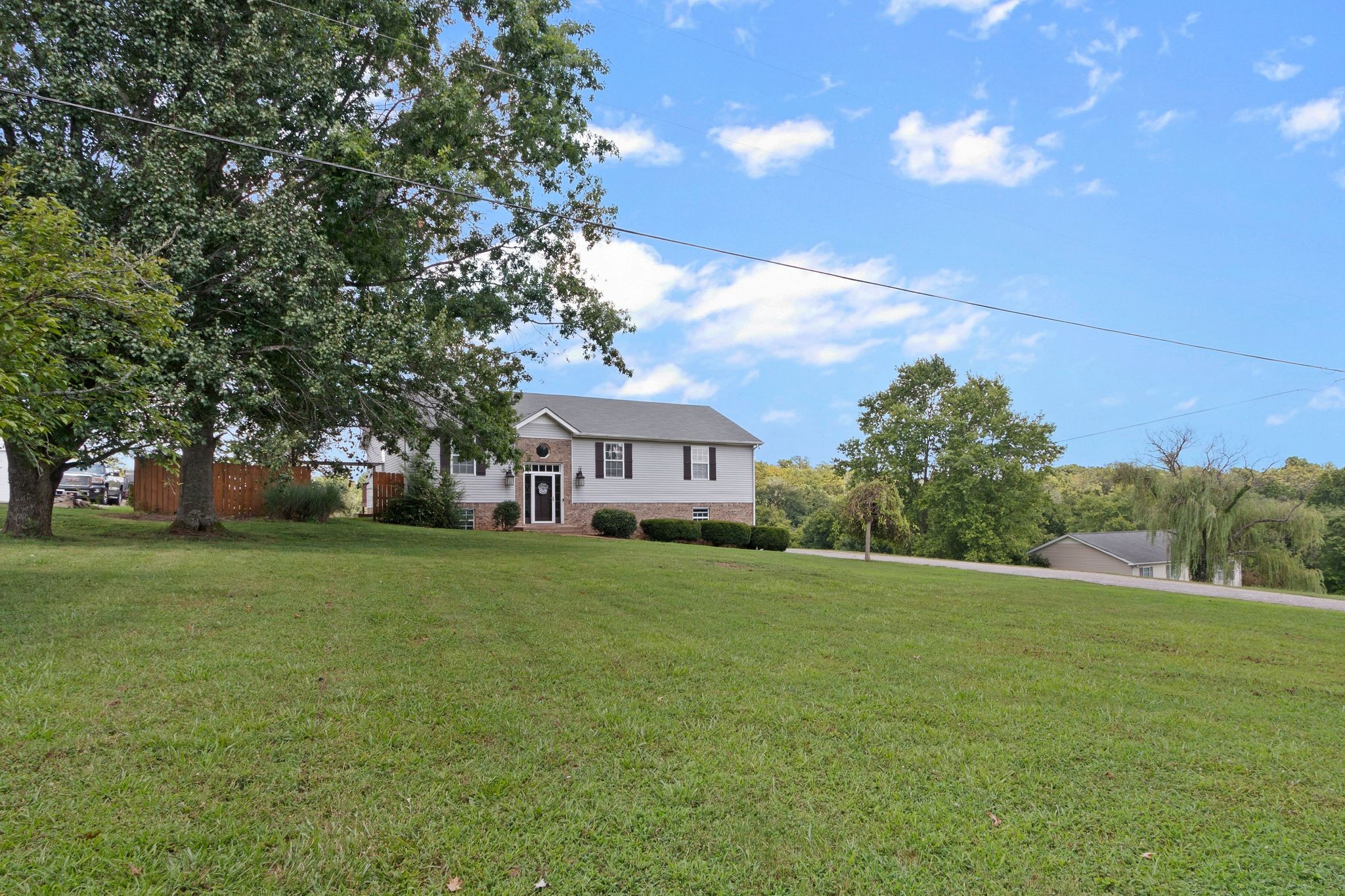 2137 Lee Road Spring Hill, TN 37174 - Photo 8 of 49 a view of a house with a big yard