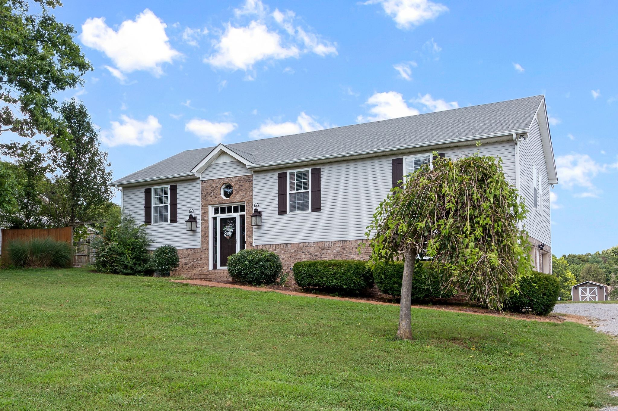 2137 Lee Road Spring Hill, TN 37174 - Photo 9 of 49 a front view of a house with a yard