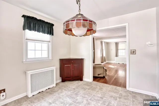 wooden floor chandelier and window
