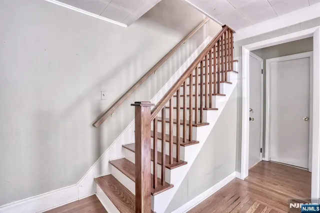 a view of entryway with wooden floor