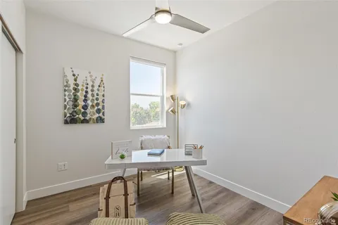 a workspace with furniture and wooden floor