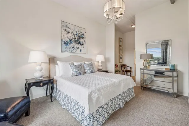 a bedroom with bed and window