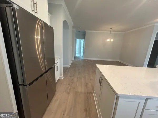a view of wooden floor and staircase