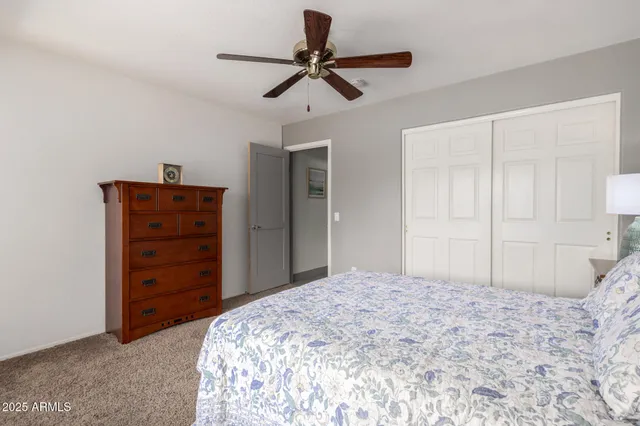 a work room with furniture and a window