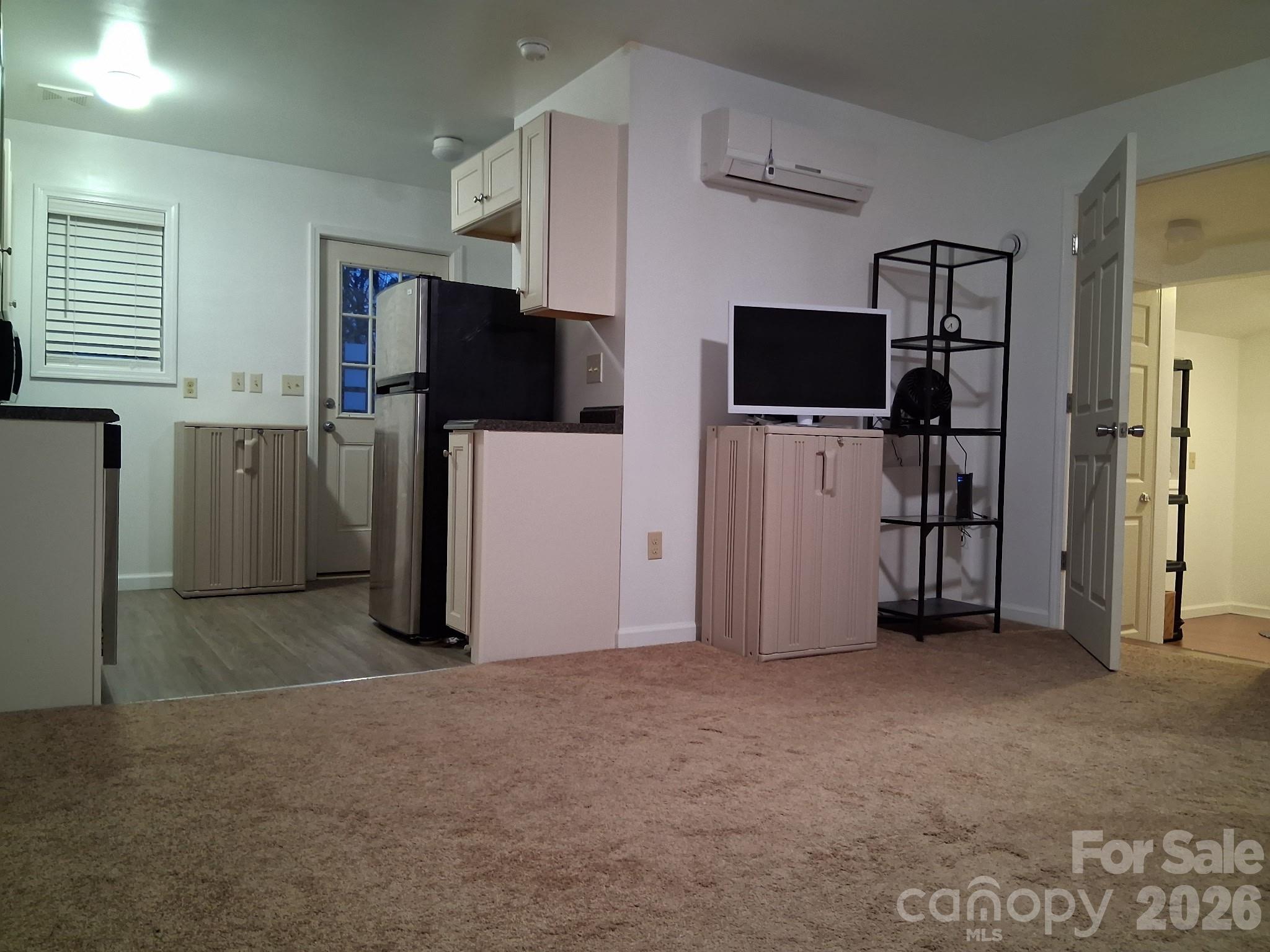 2 Oak Street Rhodhiss, NC 28667 - Photo 3 of 5 a view of a livingroom with furniture and a flat screen tv