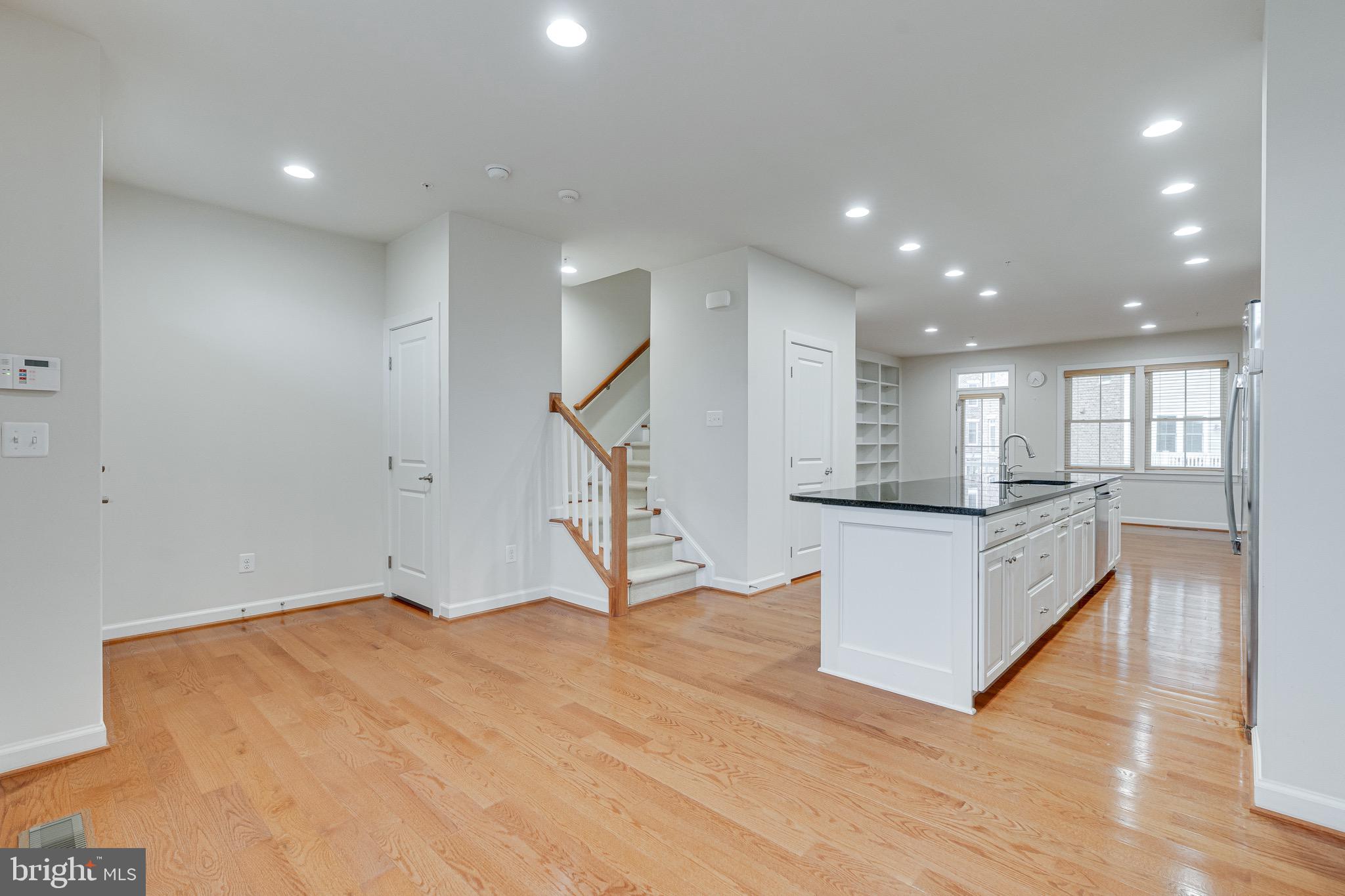 11357 Ridgeline Road Fairfax, VA 22030 - Photo 19 of 57 a view of kitchen and hall with wooden floor