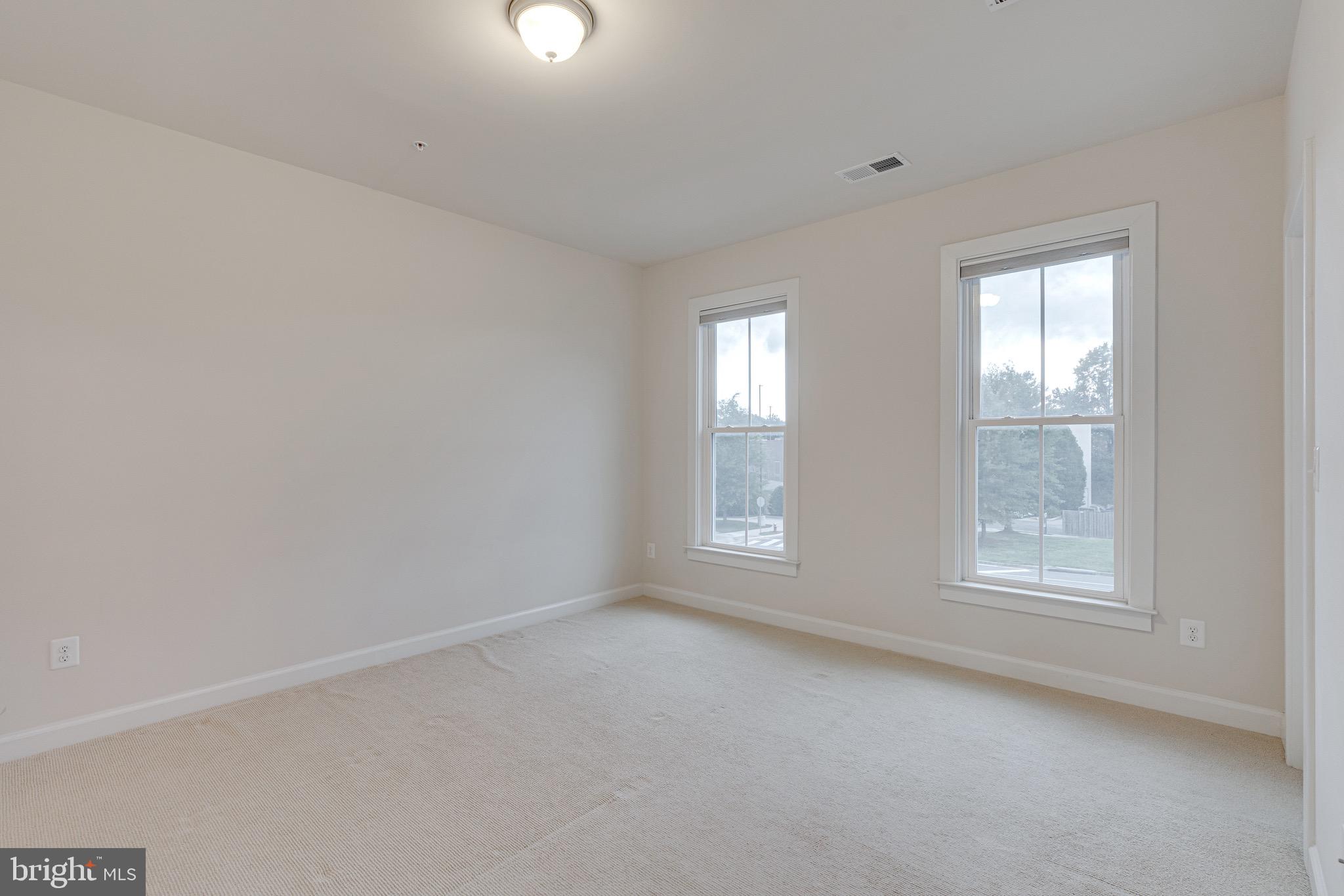 11357 Ridgeline Road Fairfax, VA 22030 - Photo 22 of 57 an empty room with windows