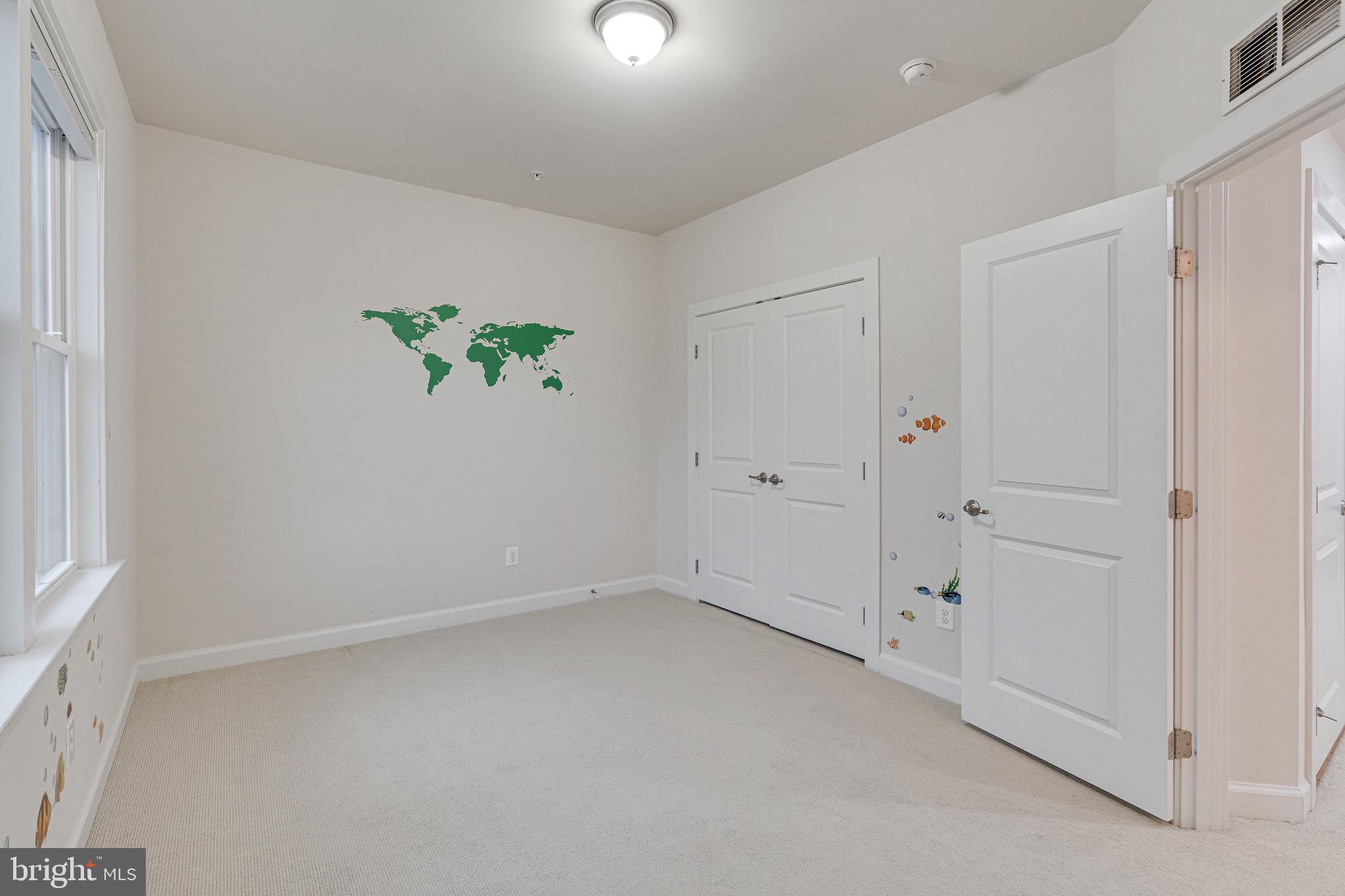 11357 Ridgeline Road Fairfax, VA 22030 - Photo 30 of 57 an empty room with white wall and closet