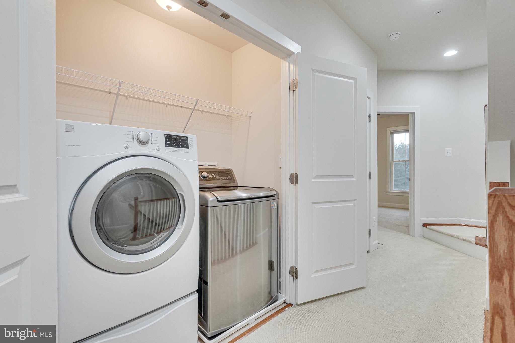 11357 Ridgeline Road Fairfax, VA 22030 - Photo 34 of 57 a storage room with washer and dryer