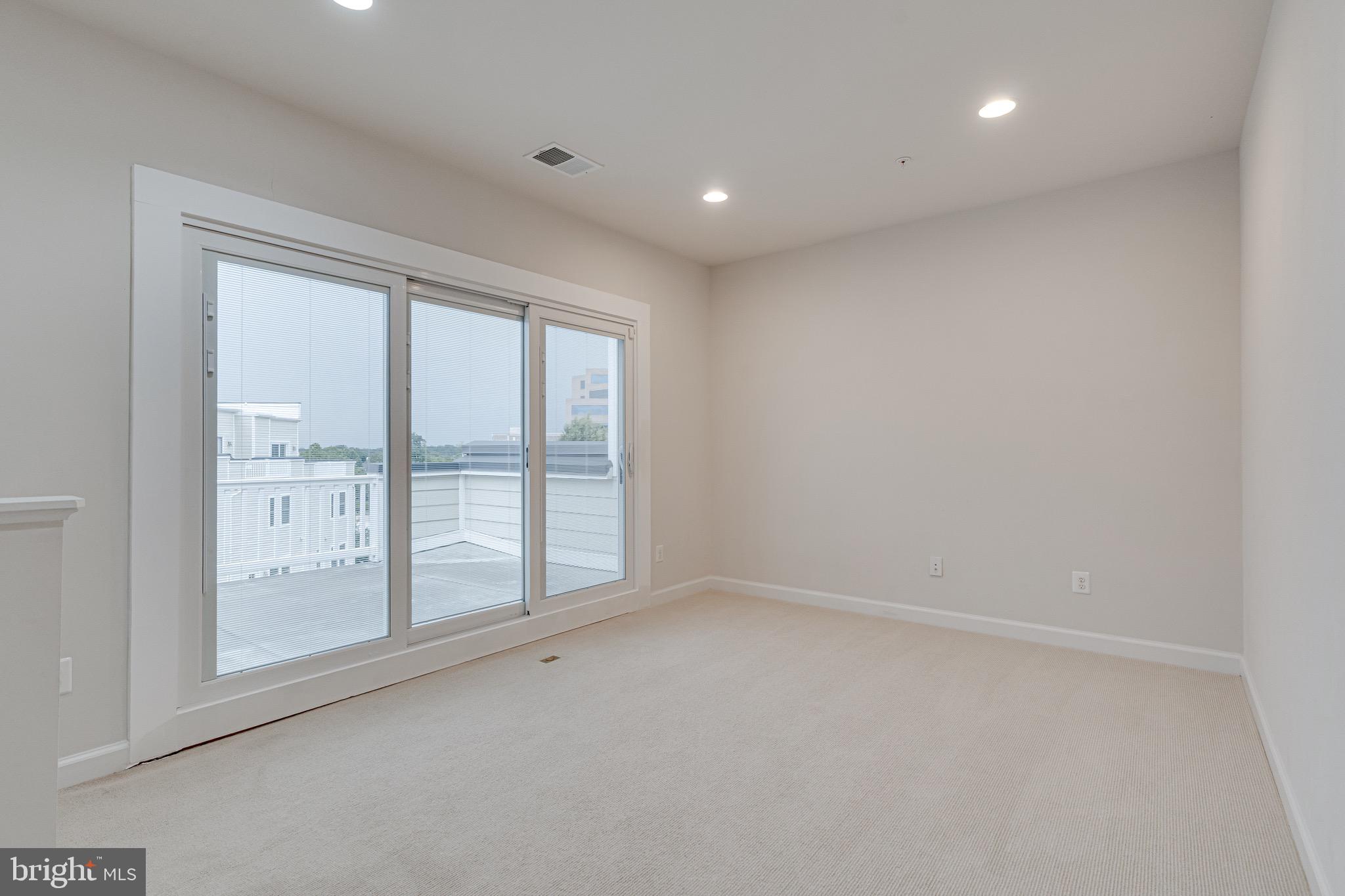 11357 Ridgeline Road Fairfax, VA 22030 - Photo 37 of 57 a view of an empty room with a window