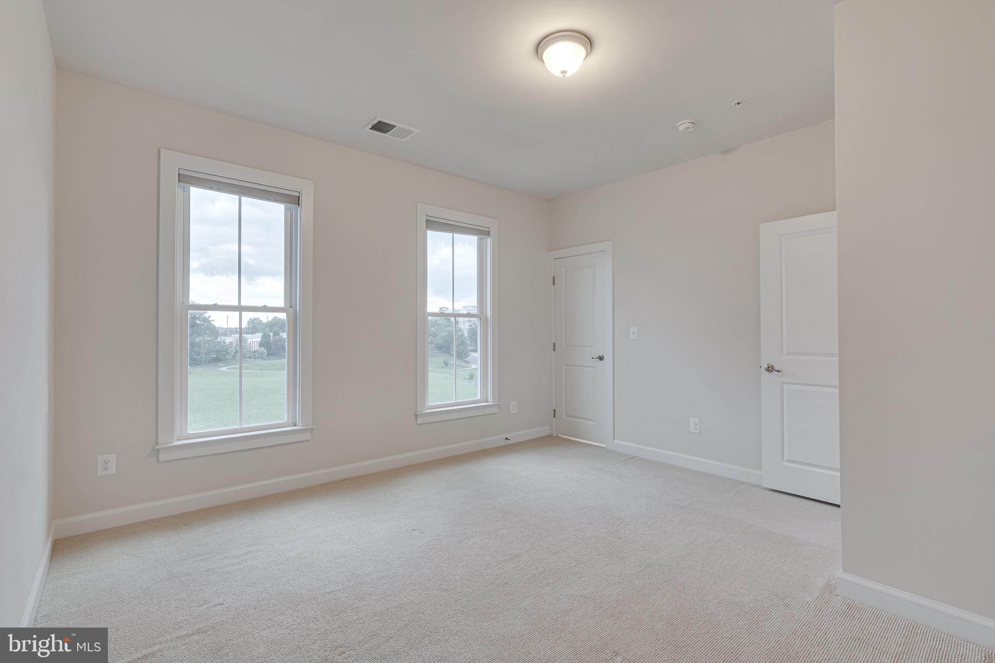 11357 Ridgeline Road Fairfax, VA 22030 - Photo 43 of 57 an empty room with windows