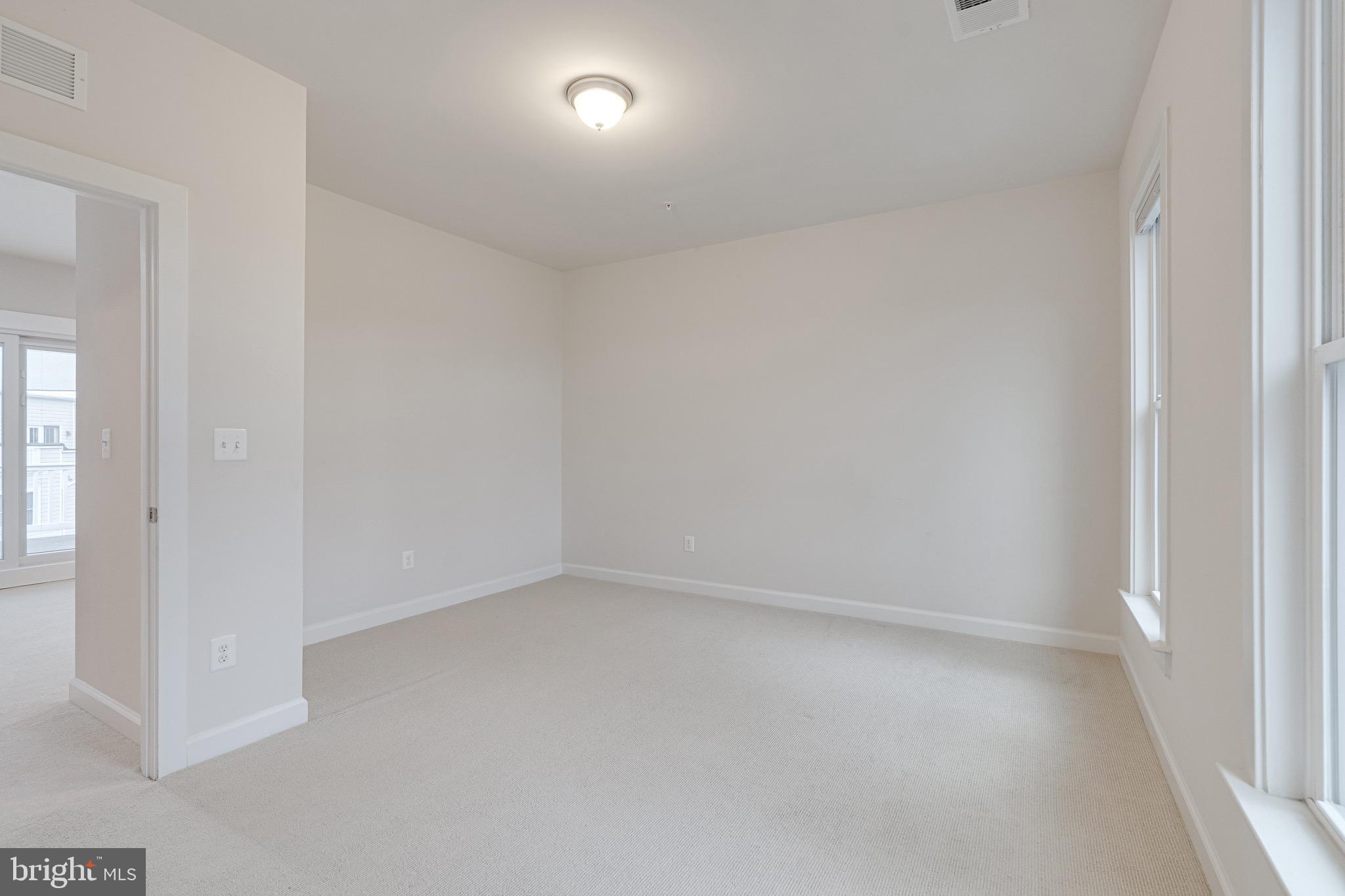 11357 Ridgeline Road Fairfax, VA 22030 - Photo 44 of 57 an empty room with a empty space and windows