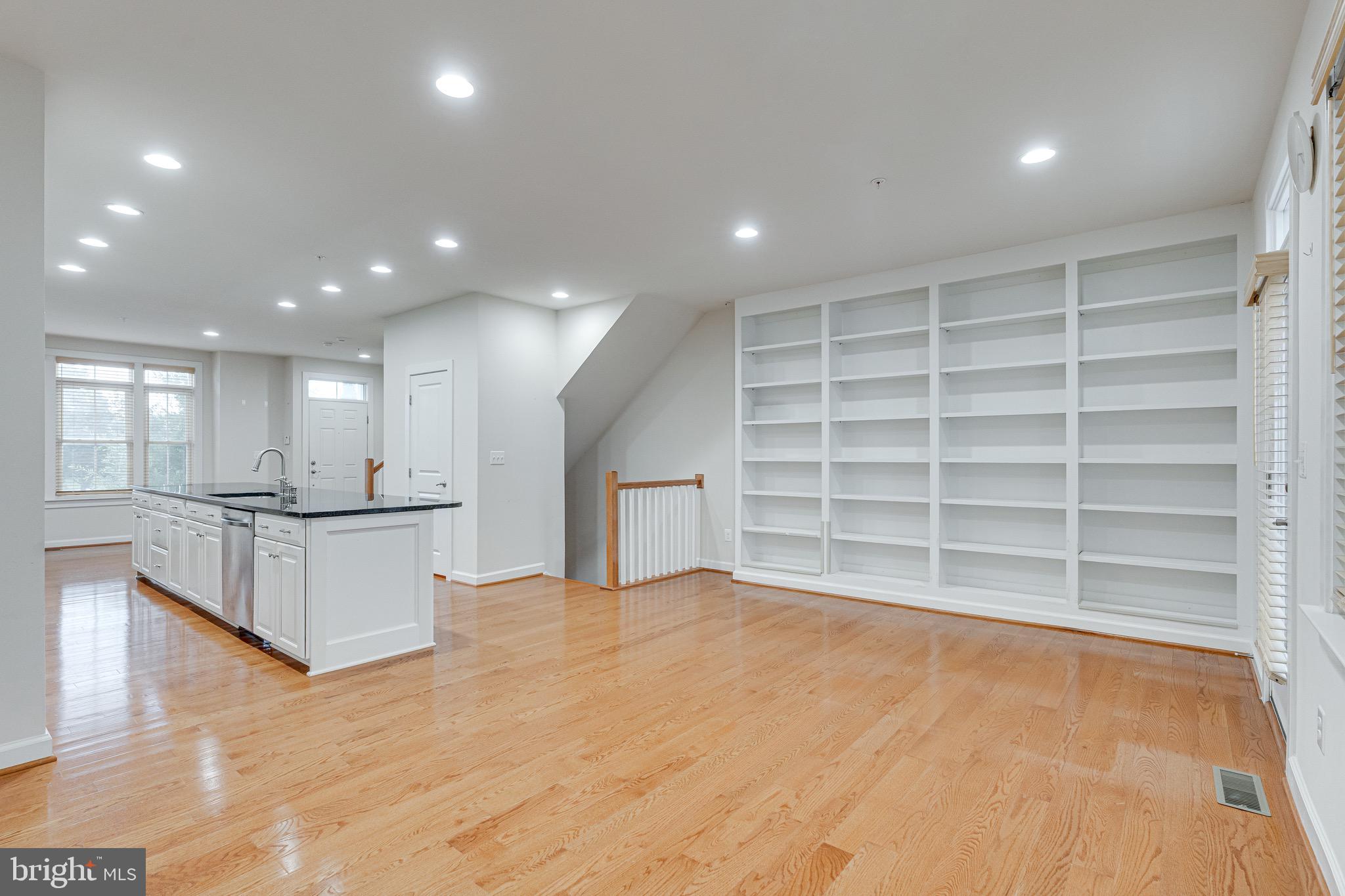 11357 Ridgeline Road Fairfax, VA 22030 - Photo 8 of 57 a view of an empty room with a cabinet and mirrors